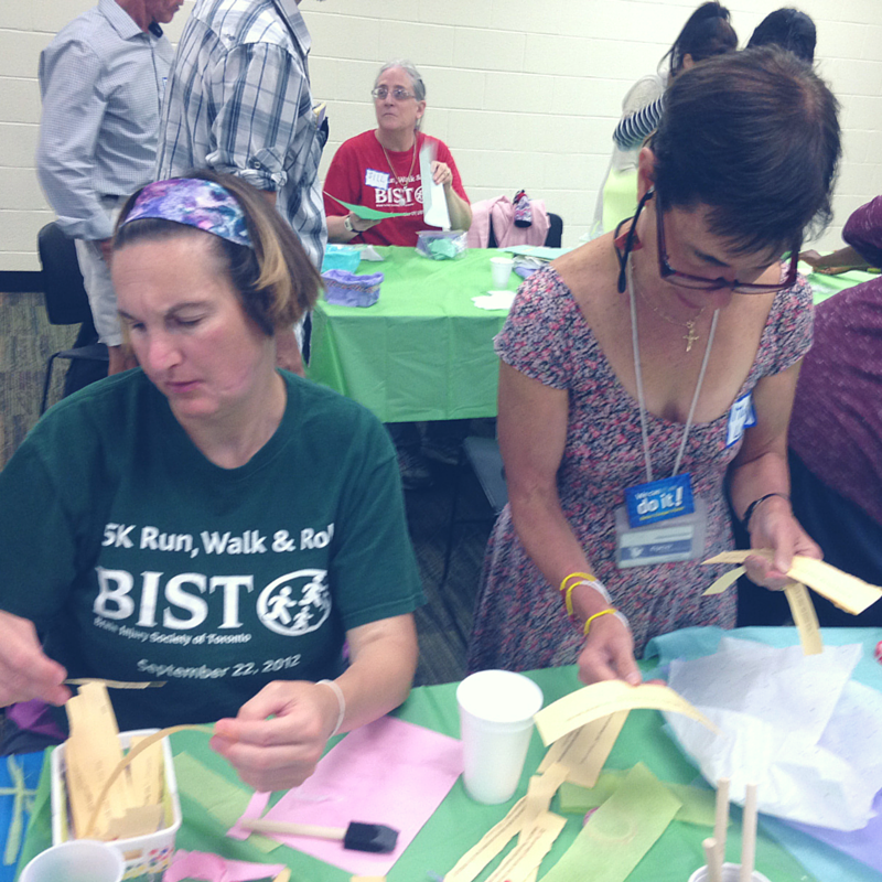 Two BIST members work on affirmation baskets