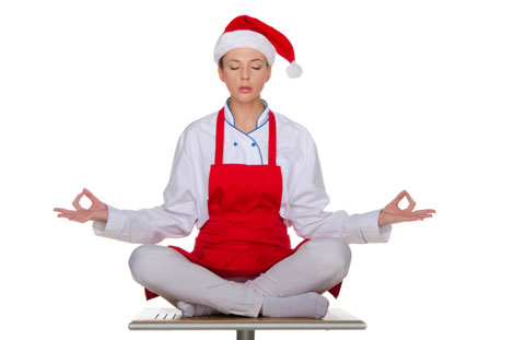 woman in santa claus hat meditating